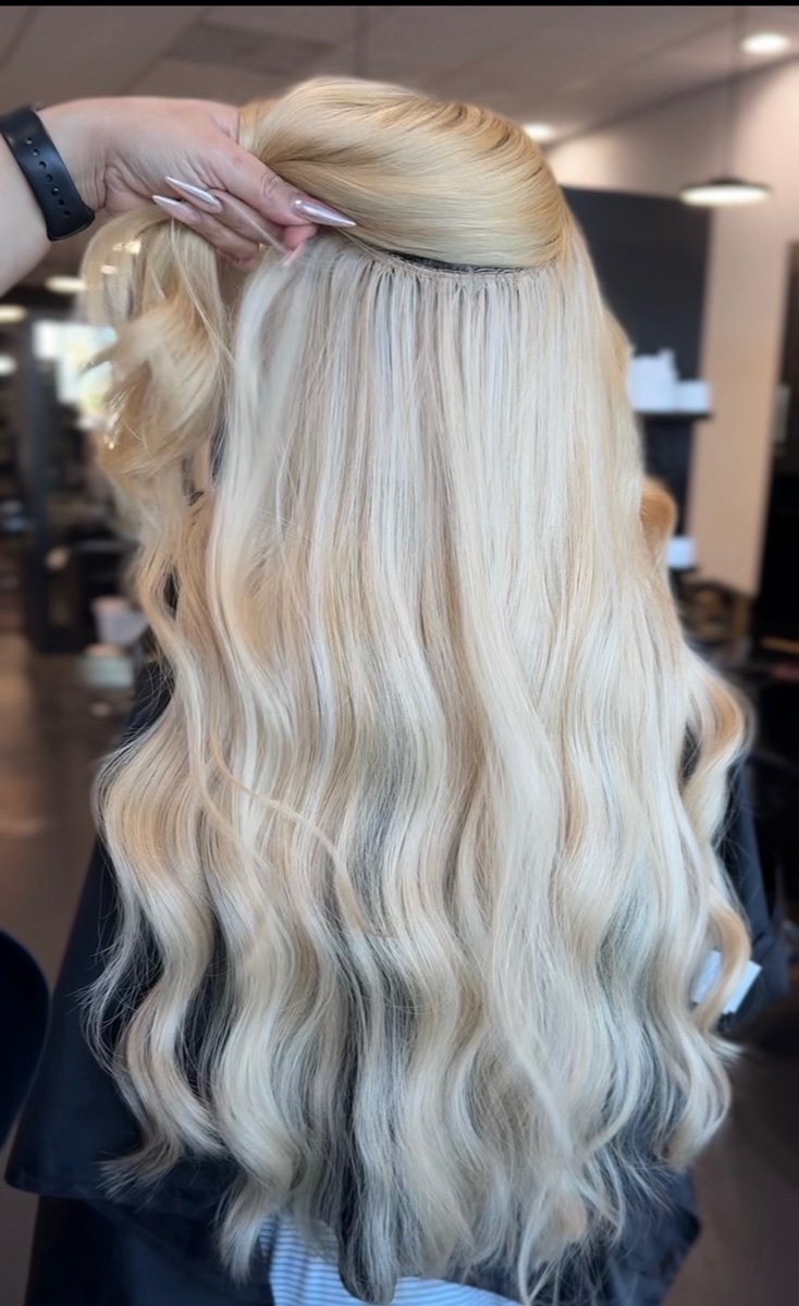 Hair extensions by Karla C